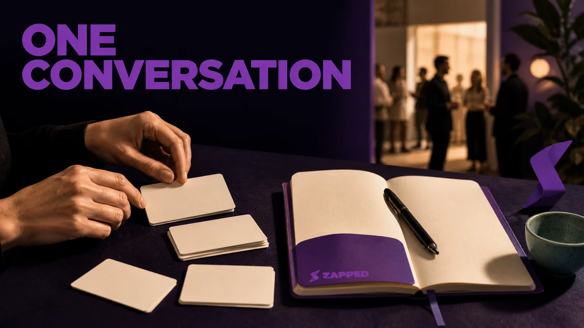 Professional preparing blank contact cards and a small notebook before entering a networking event
