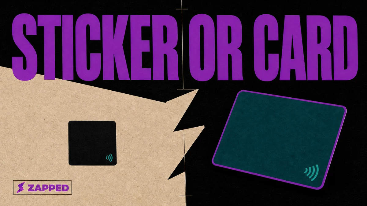 Editorial illustration of a small NFC sticker beside a full size NFC business card, the sticker's tiny antenna against the card's perimeter antenna, near metal marking where one stops working