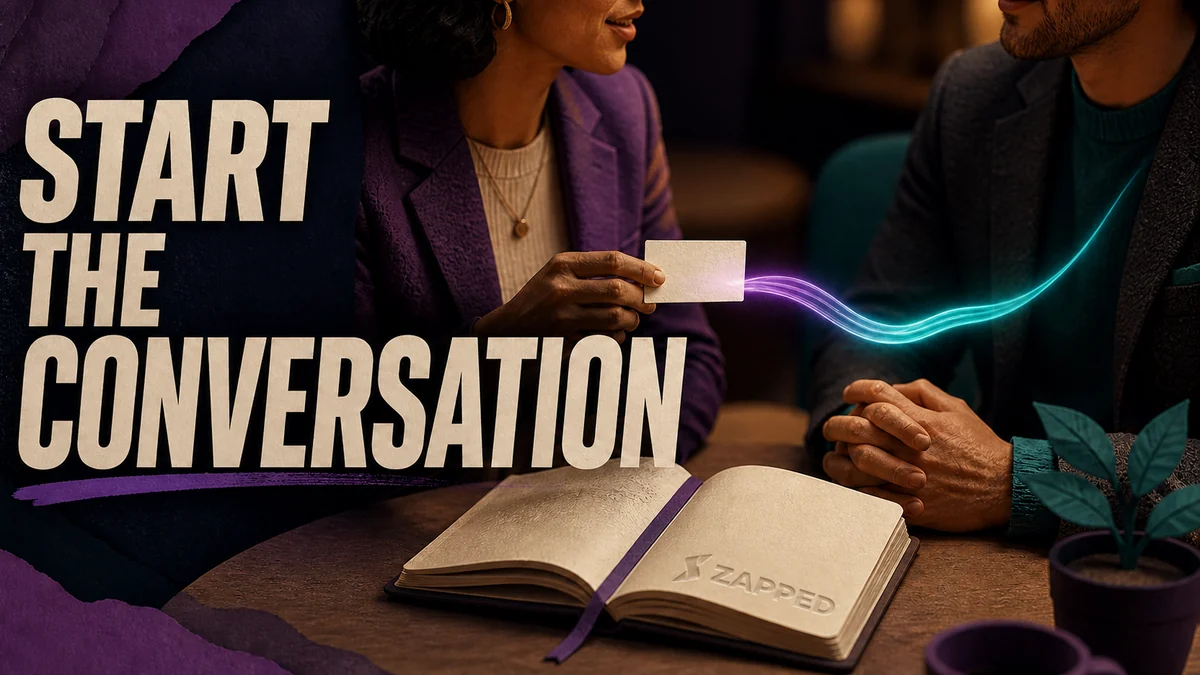 Professional at a networking table sharing a concise introduction with another person.