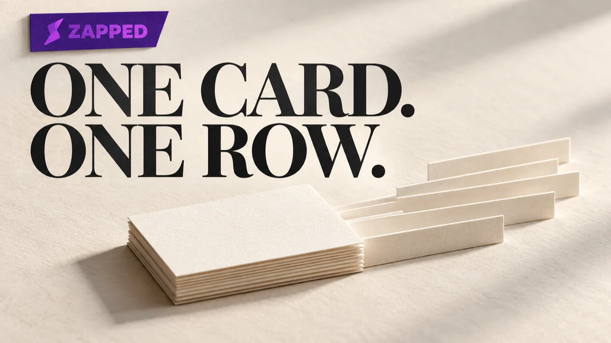 A small pile of paper business cards transforming into orderly spreadsheet rows on a clean desk.