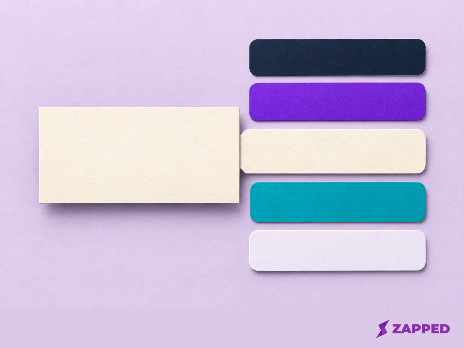 A blank business card beside abstract field blocks for checking scanner field placement